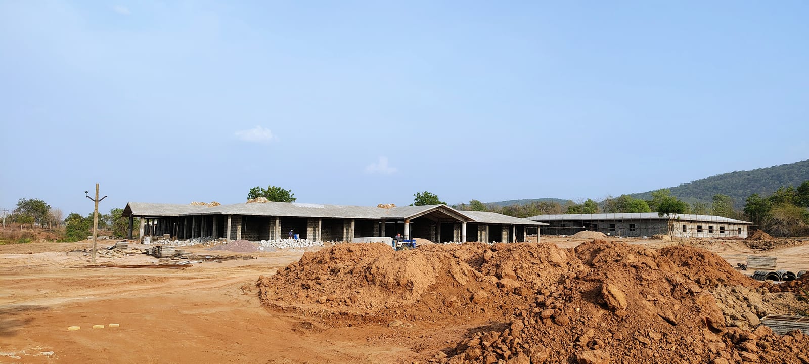 Lakeside Ramappa campus buildings with sloped RCC roofs under construction