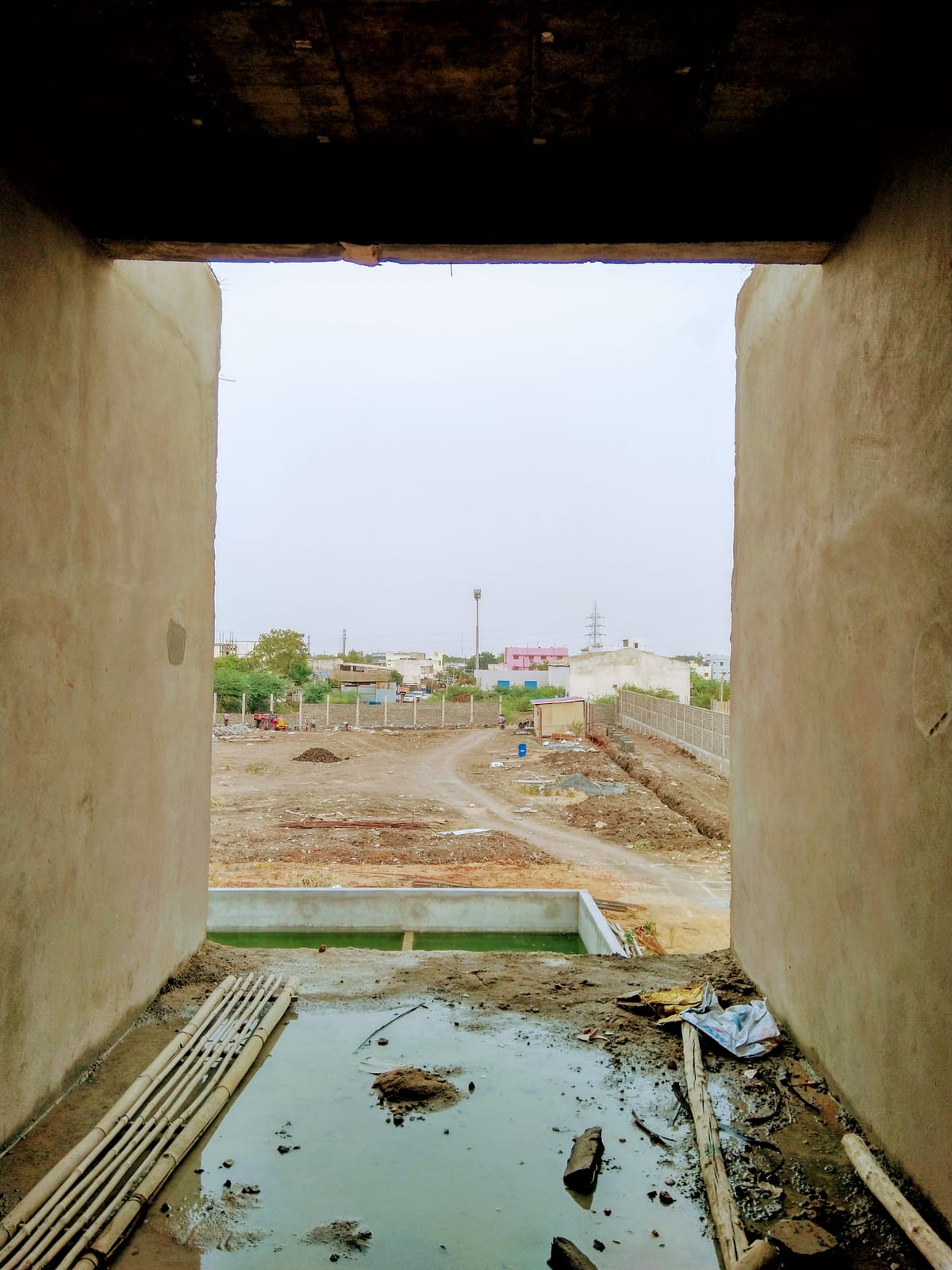 Byreddy House interior opening framing the site during construction